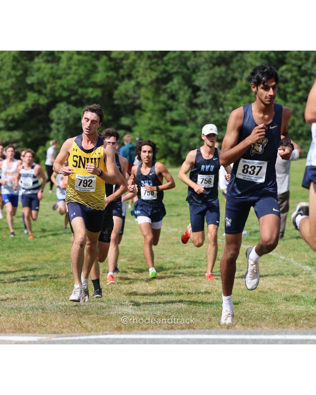 #837 Nathan Dsilva, Suffolk, 8k Run - Men (Gold-35:cap), P179, 28:39.21; #792 Brett Trainor, SNHU; #756 Oliver Polster, Roger Williams, 8k Run - Men (Gold-35:cap), P154, 27:58.86 - 2026 UMass Dartmouth XC Invitational - UMass Dartmouth - Dartmouth, Massachusetts - September 19, 2026 File: ./260919-2026-UMass-Dartmouth-XC-Invitational-108-398A5562.jpg #837 Nathan Dsilva, Suffolk, 8k Run - Men (Gold-35:cap), P179, 28:39.21; #792 Brett Trainor, SNHU; #756 Oliver Polster, Roger Williams, 8k…