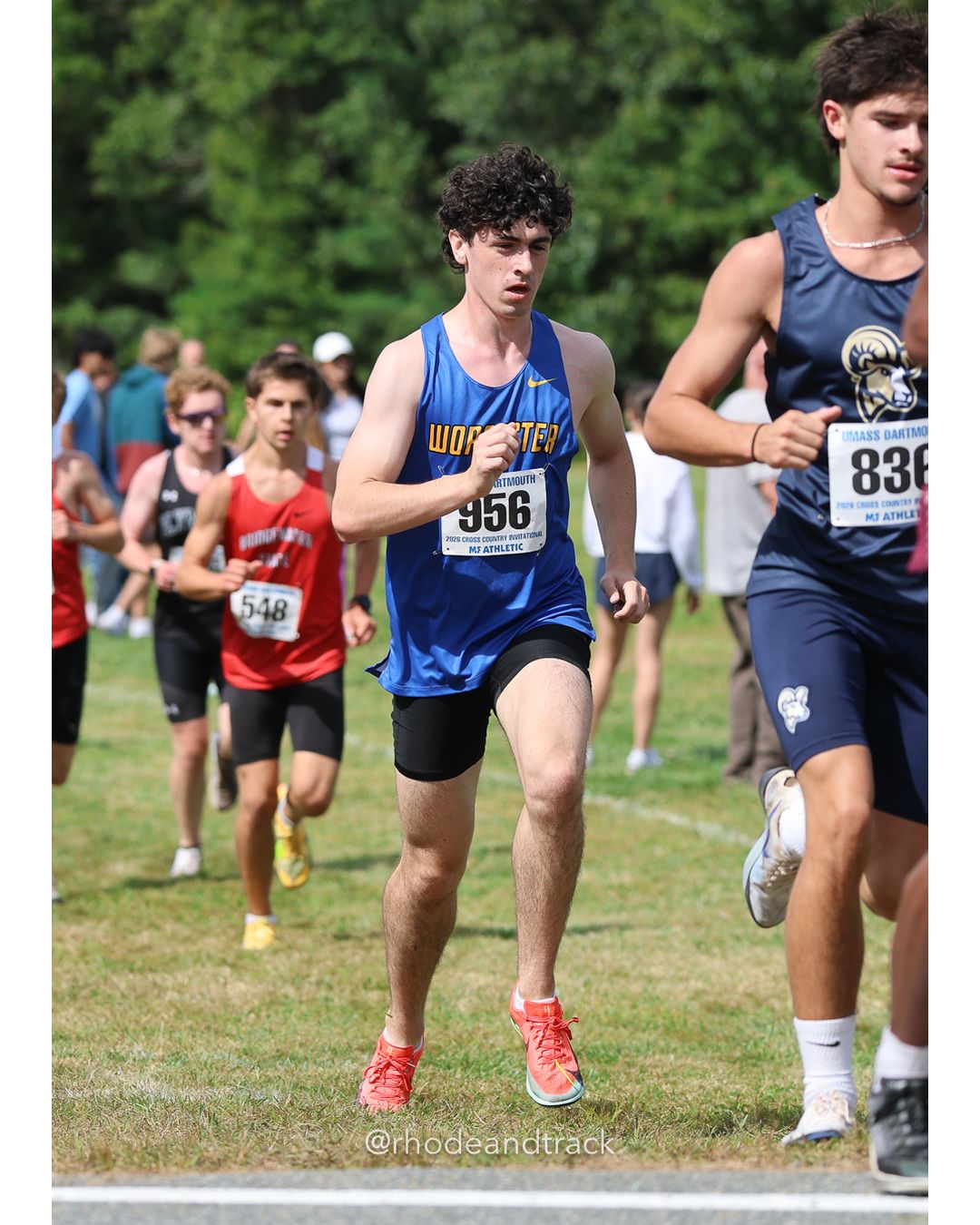 #83 Hannah Petersen, Connecticut College, 6k Run - Women (Gold-35:cap), P94, 23:54.44; #518 Joshua Phinney, Assumption, 8k Run - Men (Navy-45:cap), P87, 28:59.07 - 2026 UMass Dartmouth XC Invitational - UMass Dartmouth - Dartmouth, Massachusetts - September 19, 2026 File: ./260919-2026-UMass-Dartmouth-XC-Invitational-112-398A5636.jpg #83 Hannah Petersen, Connecticut College, 6k Run - Women (Gold-35:cap), P94, 23:54.44; #518 Joshua Phinney, Assumption, 8k Run - Men (Navy-…