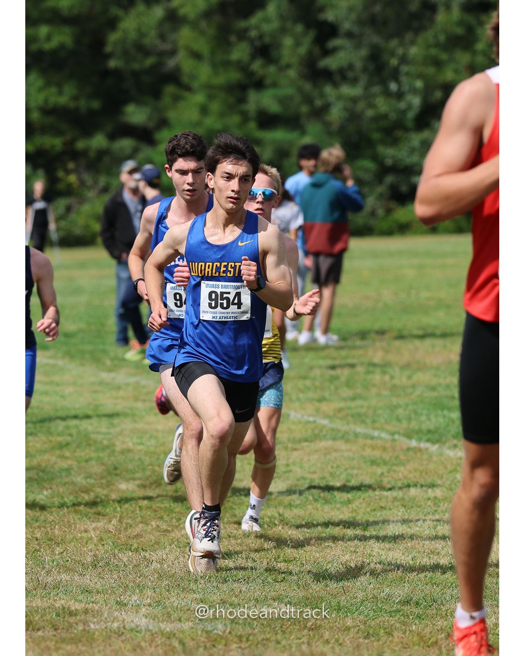 #954 Taku Pettengill, Worcester State, 8k Run - Men (Gold-35:cap), P187, 28:57.56; #9 Megan Andress, Assumption, 6k Run - Women (Navy-45:cap), P109, 27:23.71 - 2026 UMass Dartmouth XC Invitational - UMass Dartmouth - Dartmouth, Massachusetts - September 19, 2026 File: ./260919-2026-UMass-Dartmouth-XC-Invitational-119-398A5770.jpg #954 Taku Pettengill, Worcester State, 8k Run - Men (Gold-35:cap), P187, 28:57.56; #9 Megan Andress, Assumption, 6k Run - Women (Navy-45:ca…