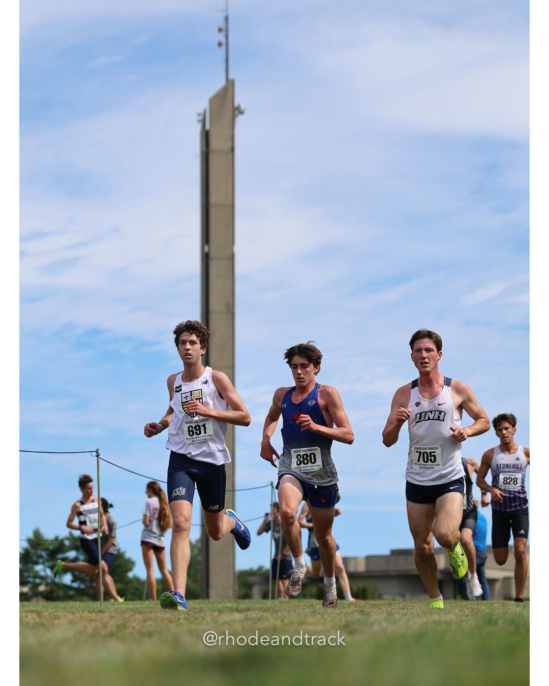 #691 Aidan Dupill, Merrimack, 8k Run - Men (Gold-35:cap), P4, 24:39.24; #705 Gavin Malark, New Hampshire, 8k Run - Men (Gold-35:cap), P9, 24:57.49; #880 Christopher Guerin, UMass Lowell, 8k Run - Men (Gold-35:cap), P8, 24:46.90 - 2026 UMass Dartmouth XC Invitational - UMass Dartmouth - Dartmouth, Massachusetts - September 19, 2026 File: ./260919-2026-UMass-Dartmouth-XC-Invitational-130-398A6000.jpg #691 Aidan Dupill, Merrimack, 8k Run - Men (Gold-35:cap), P4, 24:39.24; #705 Gavin Malark, New Hampshire, 8k Run - Men (Gold-35:cap), P9, 2…