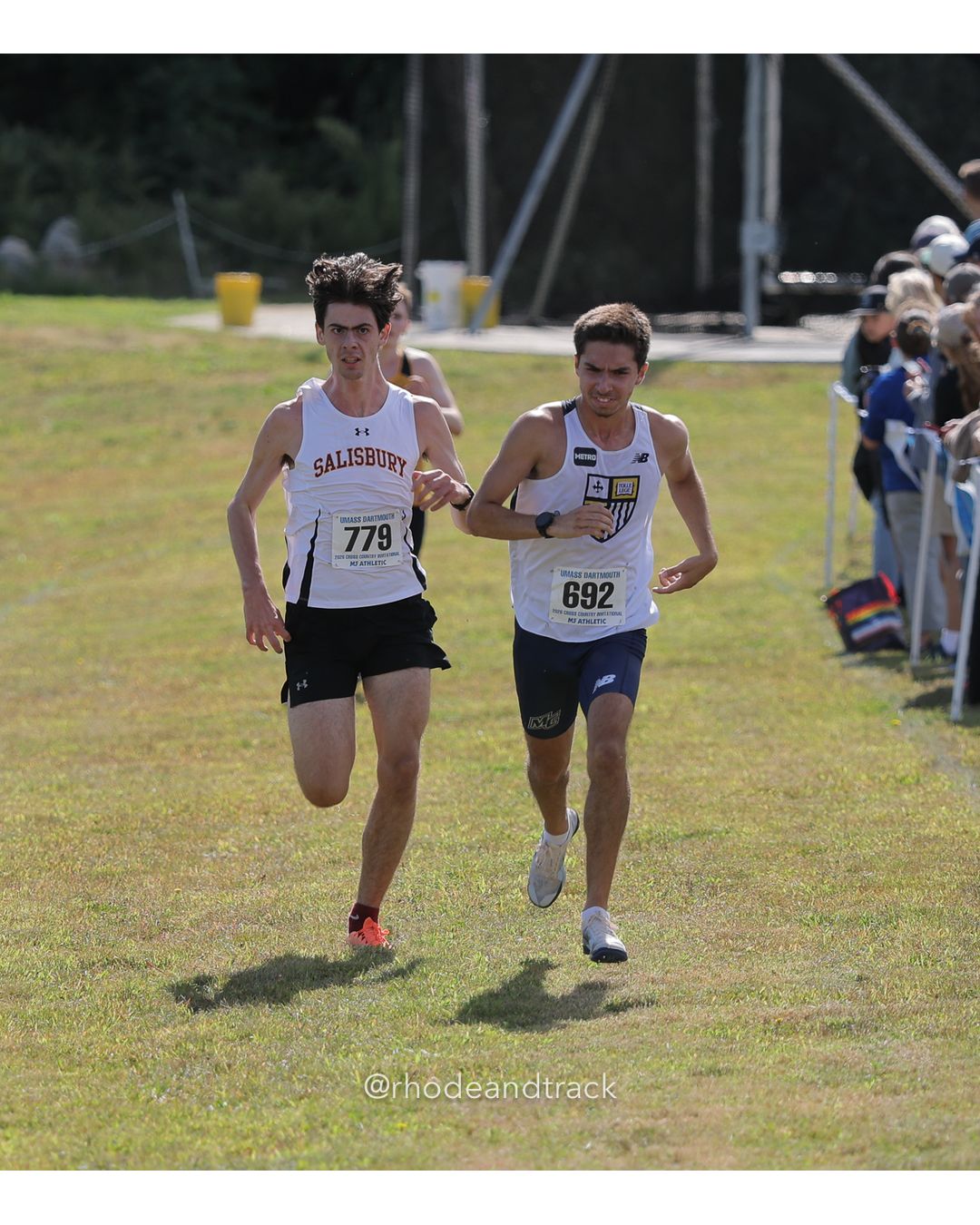 #692 Nicolas FloresQuero Llamas, Merrimack, 8k Run - Men (Navy-45:cap), P27, 26:52.44; #779 Owen Viglione, Salisbury, 8k Run - Men (Navy-45:cap), P26, 26:51.65 - 2026 UMass Dartmouth XC Invitational - UMass Dartmouth - Dartmouth, Massachusetts - September 19, 2026 File: ./260919-2026-UMass-Dartmouth-XC-Invitational-15-398A3875.jpg #692 Nicolas FloresQuero Llamas, Merrimack, 8k Run - Men (Navy-45:cap), P27, 26:52.44; #779 Owen Viglione, Salisbury, 8k Run - Men (Navy-45…