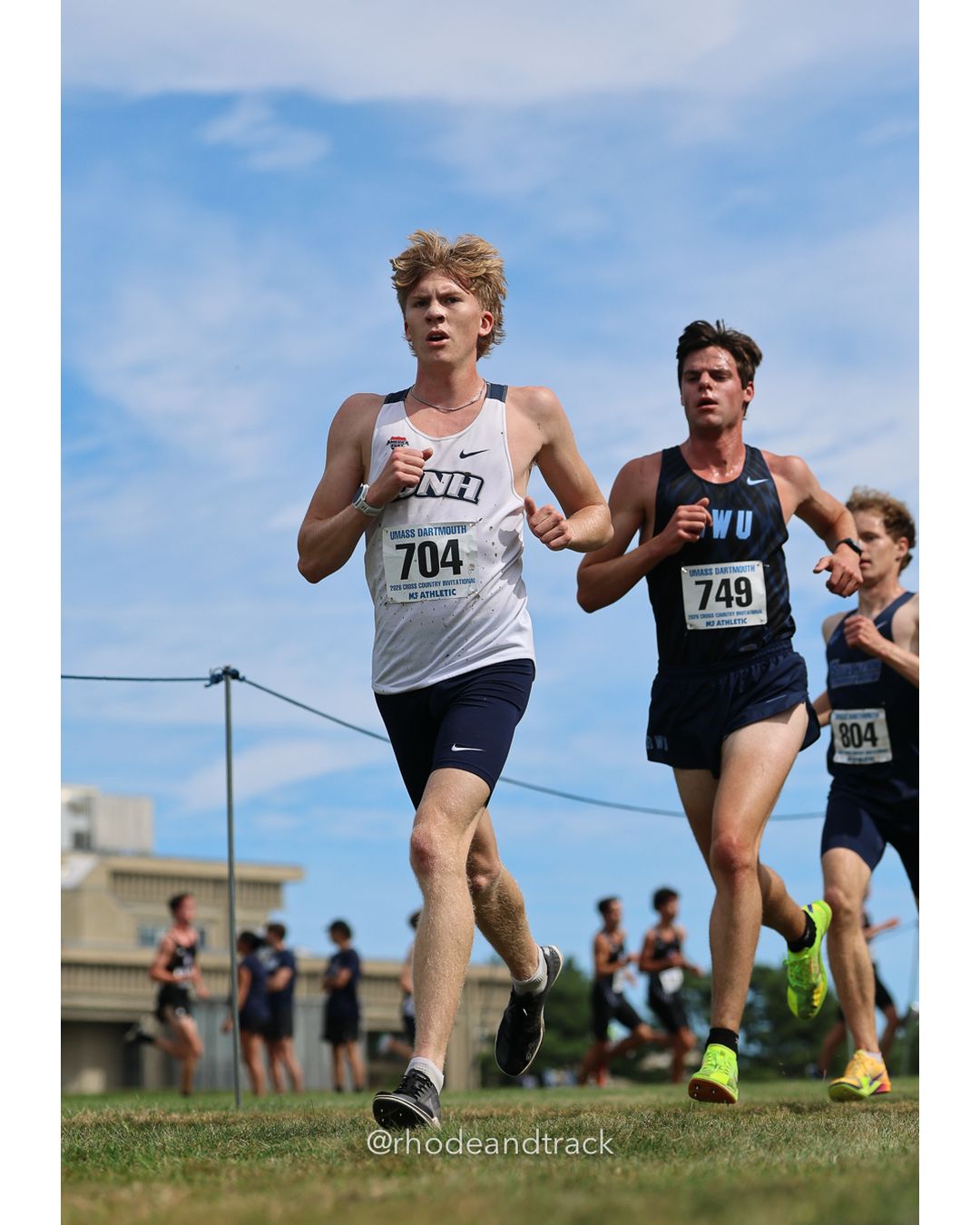 #749 Nathan Evans, Roger Williams, 8k Run - Men (Gold-35:cap), P56, 25:59.73; #804 Dominic Tartarelli, So. Conn. St., 8k Run - Men (Gold-35:cap), P52, 25:56.74 - 2026 UMass Dartmouth XC Invitational - UMass Dartmouth - Dartmouth, Massachusetts - September 19, 2026 File: ./260919-2026-UMass-Dartmouth-XC-Invitational-150-398A6395.jpg #749 Nathan Evans, Roger Williams, 8k Run - Men (Gold-35:cap), P56, 25:59.73; #804 Dominic Tartarelli, So. Conn. St., 8k Run - Men (Gold-35…