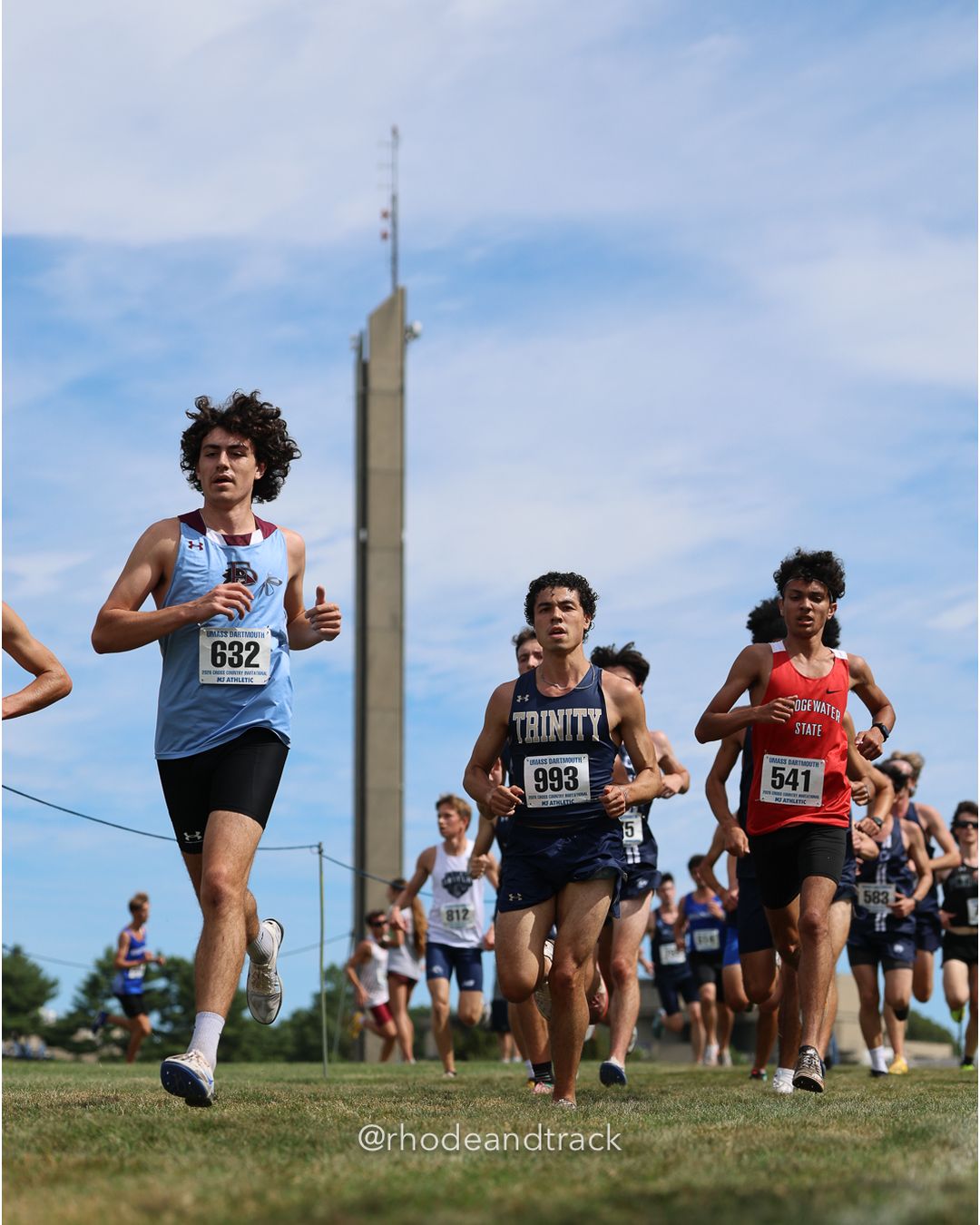 #632 Evan Spence, Franklin Pierce, 8k Run - Men (Gold-35:cap), P113, 27:00.90; #993 Douglas Smith, Trinity (Conn.), 8k Run - Men (Gold-35:cap), P91, 26:37.57; #541 Tyler Amaral, Bridgewater St., 8k Run - Men (Gold-35:cap), P114, 27:02.09 - 2026 UMass Dartmouth XC Invitational - UMass Dartmouth - Dartmouth, Massachusetts - September 19, 2026 File: ./260919-2026-UMass-Dartmouth-XC-Invitational-173-398A6757.jpg #632 Evan Spence, Franklin Pierce, 8k Run - Men (Gold-35:cap), P113, 27:00.90; #993 Douglas Smith, Trinity (Conn.), 8k Run - Men (Gold-35:c…