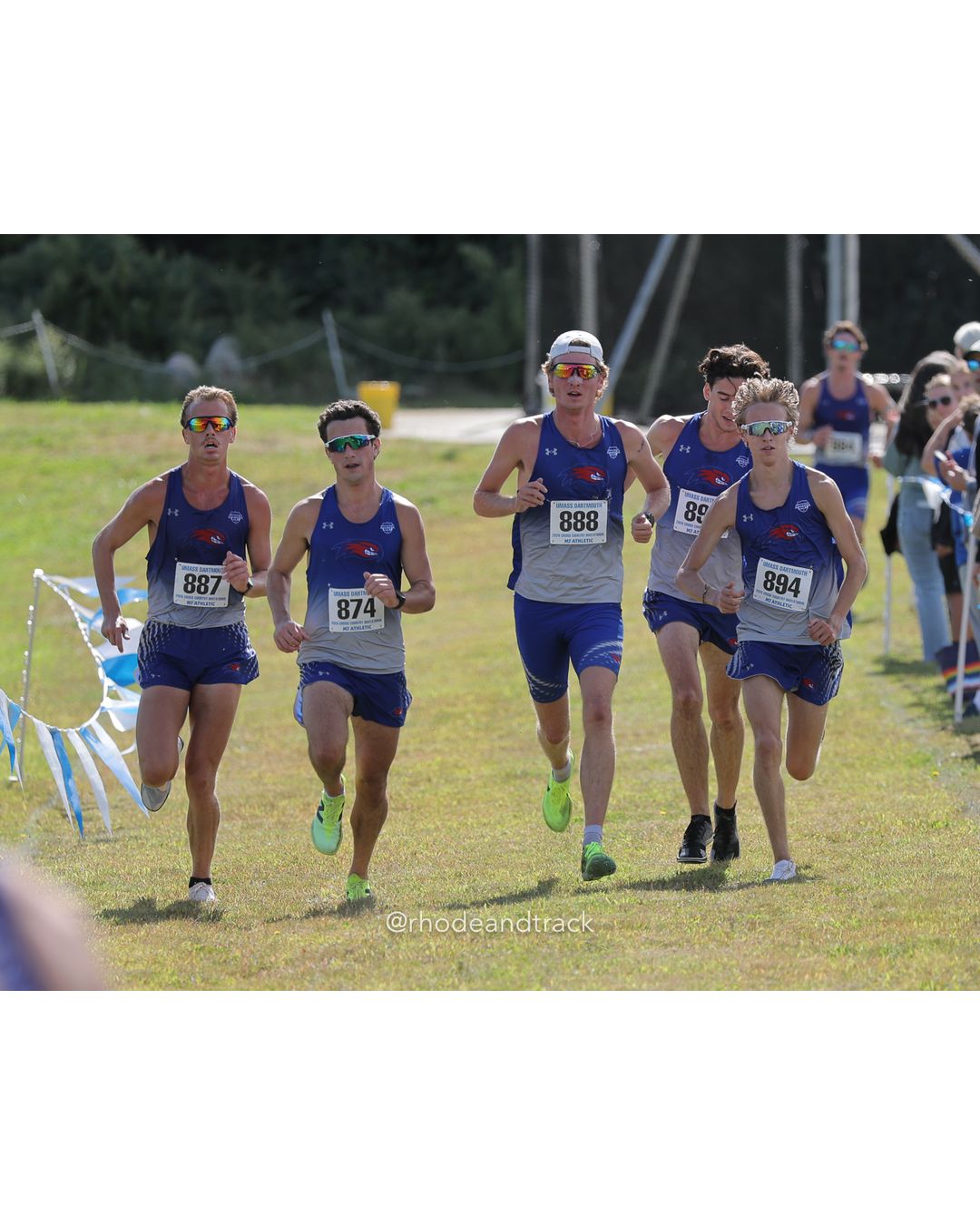 #894 William Simard, UMass Lowell, 8k Run - Men (Navy-45:cap), P9, 25:30.15; #874 Jack Courtney, UMass Lowell, 8k Run - Men (Navy-45:cap), P6, 25:29.96; #888 Ethan Mashtare, UMass Lowell, 8k Run - Men (Navy-45:cap), P10, 25:30.19 - 2026 UMass Dartmouth XC Invitational - UMass Dartmouth - Dartmouth, Massachusetts - September 19, 2026 File: ./260919-2026-UMass-Dartmouth-XC-Invitational-2-398A3632.jpg #894 William Simard, UMass Lowell, 8k Run - Men (Navy-45:cap), P9, 25:30.15; #874 Jack Courtney, UMass Lowell, 8k Run - Men (Navy-45:cap),…