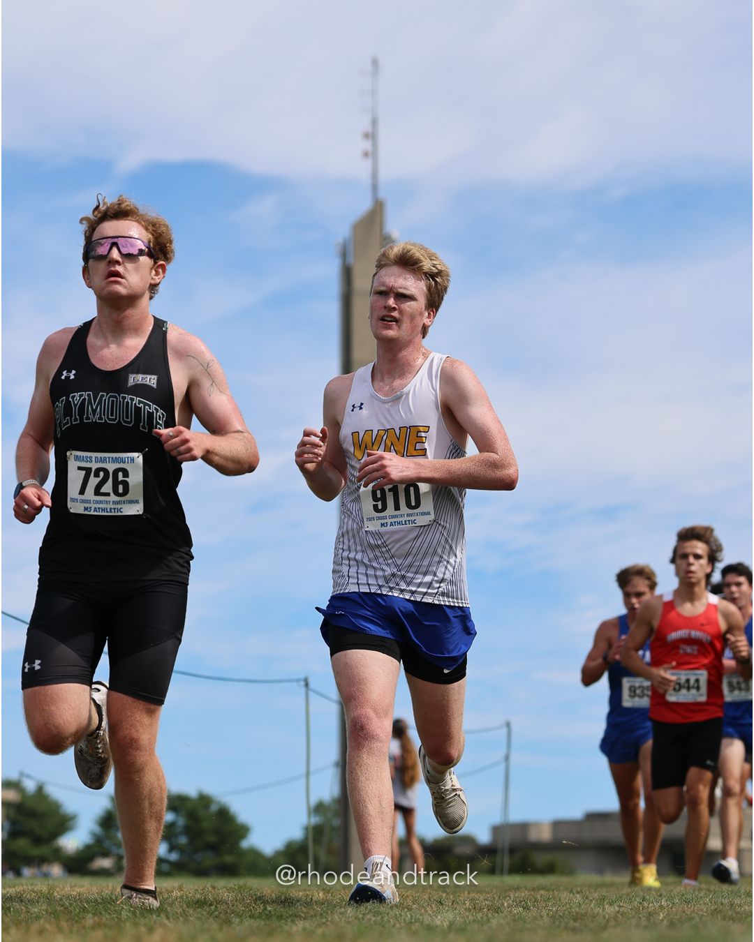 #910 Jack Gibbs, Western NE, 8k Run - Men (Gold-35:cap), P199, 29:29.12; #726 Dan Daschbach-Eaton, Plymouth State, 8k Run - Men (Gold-35:cap), P207, 30:02.95 - 2026 UMass Dartmouth XC Invitational - UMass Dartmouth - Dartmouth, Massachusetts - September 19, 2026 File: ./260919-2026-UMass-Dartmouth-XC-Invitational-217-398A7370.jpg #910 Jack Gibbs, Western NE, 8k Run - Men (Gold-35:cap), P199, 29:29.12; #726 Dan Daschbach-Eaton, Plymouth State, 8k Run - Men (Gold-35:ca…