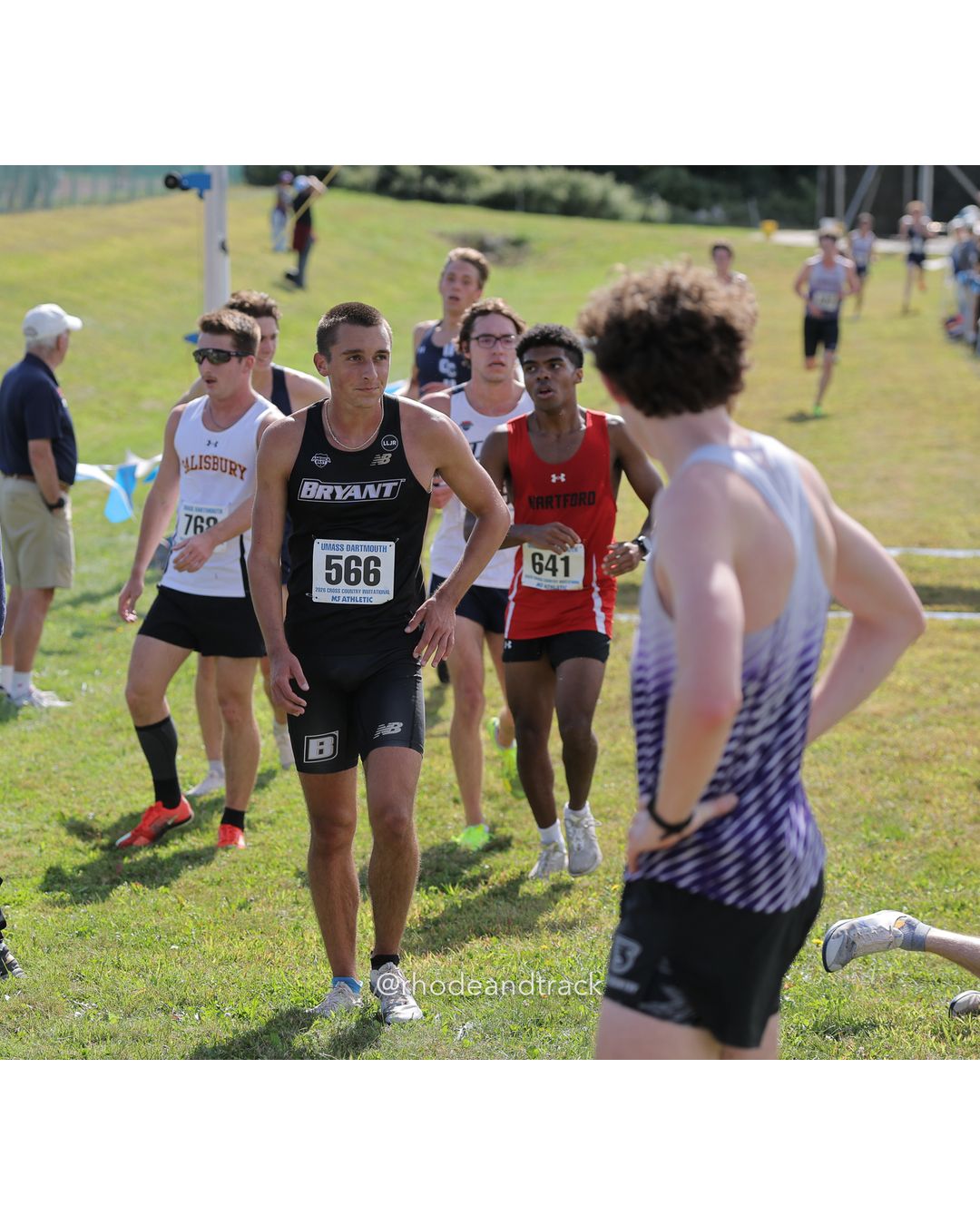 #566 Lazo Slijepcevic, Bryant, 8k Run - Men (Navy-45:cap), P41, 27:26.53; #641 Daren Johnson, Hartford, 8k Run - Men (Navy-45:cap), P46, 27:28.08 - 2026 UMass Dartmouth XC Invitational - UMass Dartmouth - Dartmouth, Massachusetts - September 19, 2026 File: ./260919-2026-UMass-Dartmouth-XC-Invitational-22-398A3951.jpg #566 Lazo Slijepcevic, Bryant, 8k Run - Men (Navy-45:cap), P41, 27:26.53; #641 Daren Johnson, Hartford, 8k Run - Men (Navy-45:cap), P46, 27…