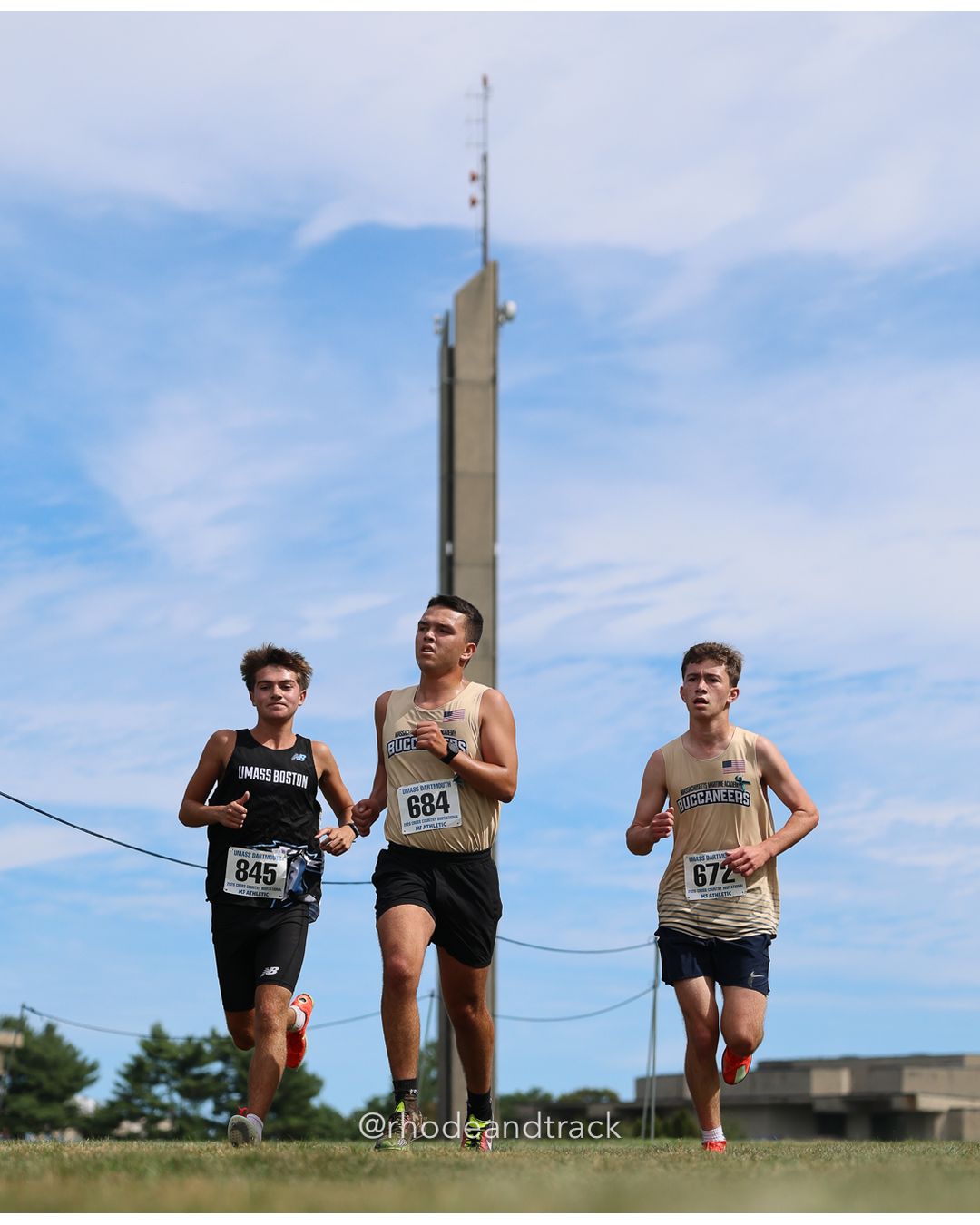 #684 Cooper Ogden, Mass. Maritime, 8k Run - Men (Gold-35:cap), P215, 30:47.37; #845 Jimmy Gallagher, UMass Boston, 8k Run - Men (Gold-35:cap), P206, 29:56.52 - 2026 UMass Dartmouth XC Invitational - UMass Dartmouth - Dartmouth, Massachusetts - September 19, 2026 File: ./260919-2026-UMass-Dartmouth-XC-Invitational-233-398A7652.jpg #684 Cooper Ogden, Mass. Maritime, 8k Run - Men (Gold-35:cap), P215, 30:47.37; #845 Jimmy Gallagher, UMass Boston, 8k Run - Men (Gold-35:ca…