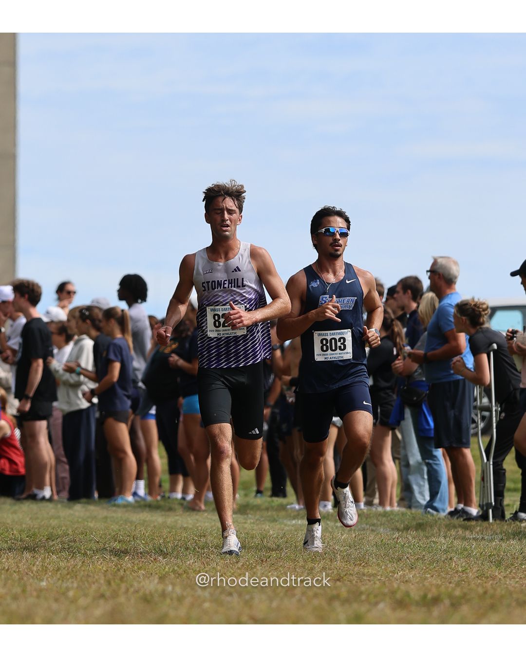 #803 Colton Sallum, So. Conn. St., 8k Run - Men (Gold-35:cap), P6, 24:39.33; #8 Amanda Tran, American Int'l, 6k Run - Women (Navy-45:cap), P168, 32:48.83 - 2026 UMass Dartmouth XC Invitational - UMass Dartmouth - Dartmouth, Massachusetts - September 19, 2026 File: ./260919-2026-UMass-Dartmouth-XC-Invitational-242-398A8022.jpg #803 Colton Sallum, So. Conn. St., 8k Run - Men (Gold-35:cap), P6, 24:39.33; #8 Amanda Tran, American Int'l, 6k Run - Women (Navy-45:cap),…