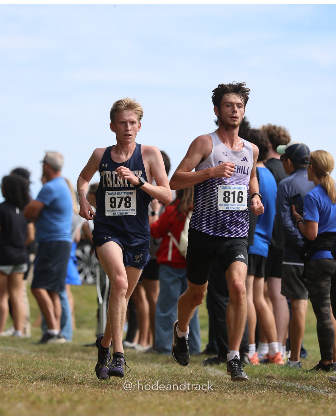 #816 Luke Allen, Stonehill, 8k Run - Men (Gold-35:cap), P24, 25:23.35; #978 Lysander Duffield, Trinity (Conn.), 8k Run - Men (Gold-35:cap), P26, 25:24.34 - 2026 UMass Dartmouth XC Invitational - UMass Dartmouth - Dartmouth, Massachusetts - September 19, 2026 File: ./260919-2026-UMass-Dartmouth-XC-Invitational-254-398A8283.jpg #816 Luke Allen, Stonehill, 8k Run - Men (Gold-35:cap), P24, 25:23.35; #978 Lysander Duffield, Trinity (Conn.), 8k Run - Men (Gold-35:cap),…