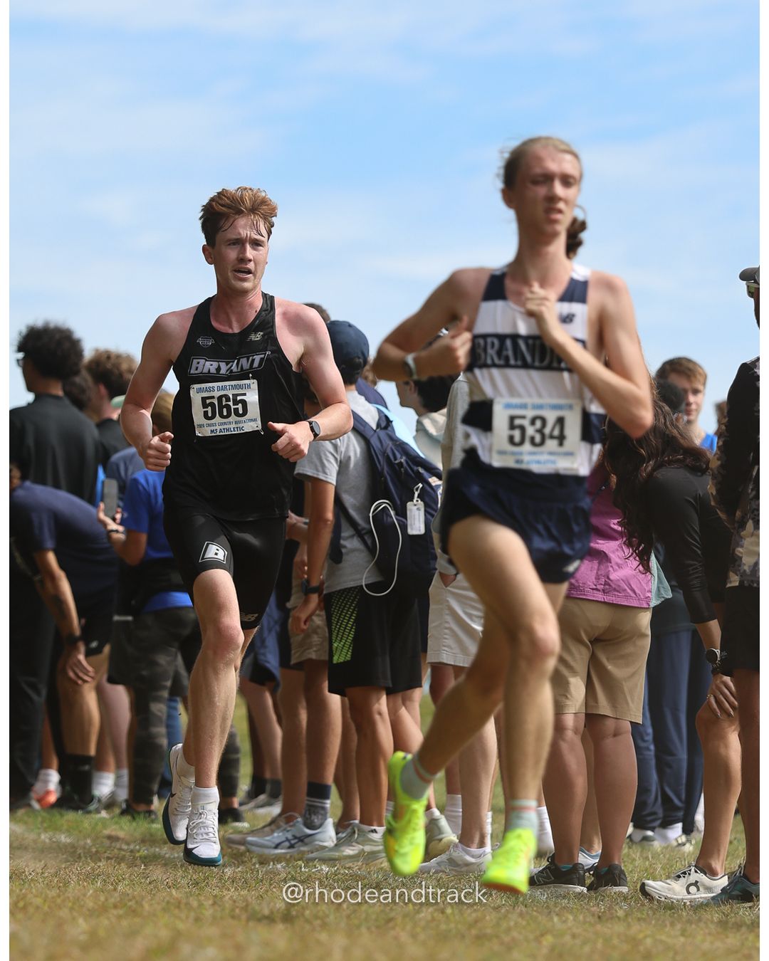 #534 Avery Innis, Brandeis, 8k Run - Men (Gold-35:cap), P58, 26:01.26; #565 Andrew Simard, Bryant, 8k Run - Men (Gold-35:cap), P64, 26:12.55 - 2026 UMass Dartmouth XC Invitational - UMass Dartmouth - Dartmouth, Massachusetts - September 19, 2026 File: ./260919-2026-UMass-Dartmouth-XC-Invitational-272-398A8725.jpg #534 Avery Innis, Brandeis, 8k Run - Men (Gold-35:cap), P58, 26:01.26; #565 Andrew Simard, Bryant, 8k Run - Men (Gold-35:cap), P64, 26:12.5…
