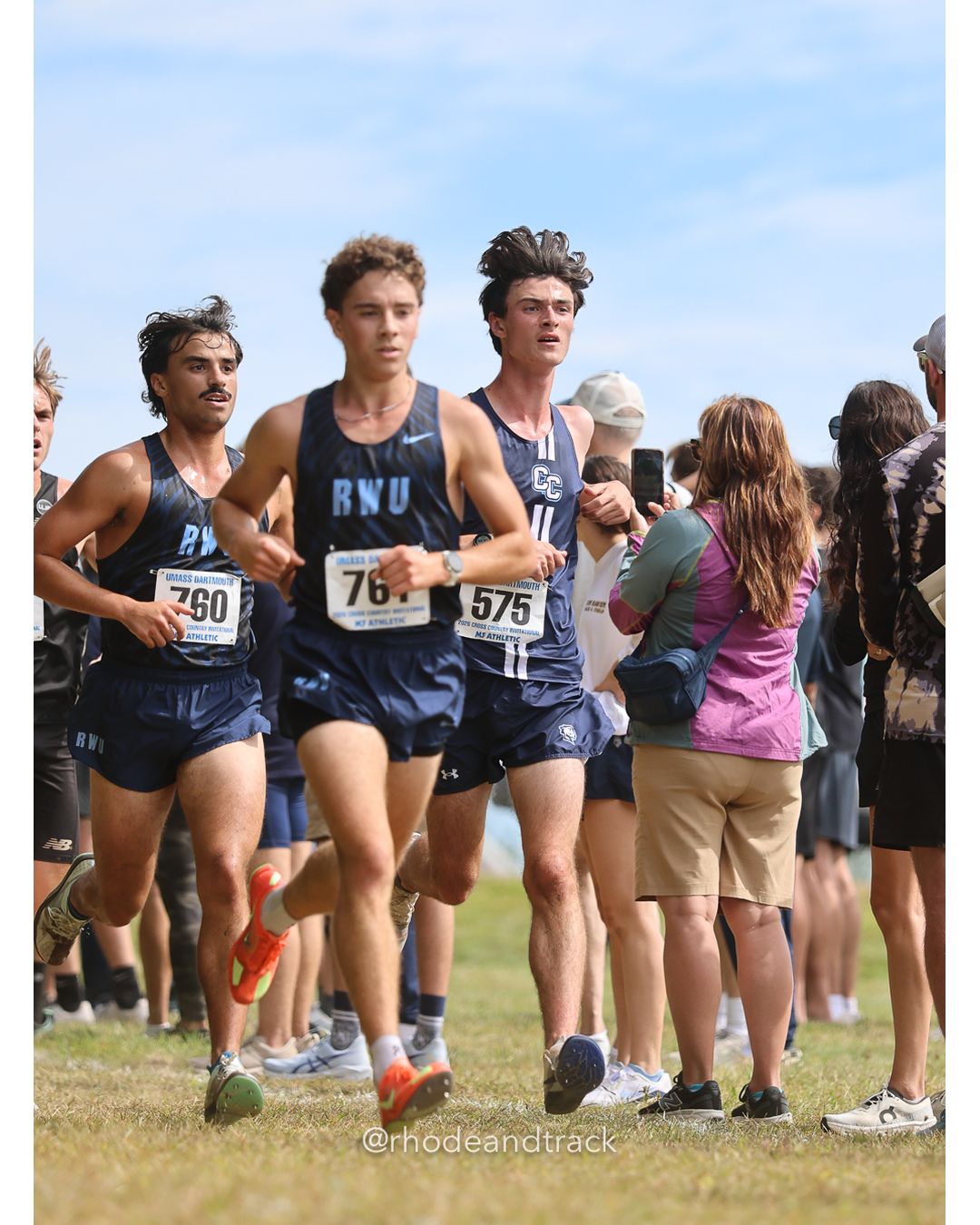 #575 John DiSturco, Connecticut College, 8k Run - Men (Gold-35:cap), P78, 26:22.44; #76 Brooke Law, Connecticut College - 2026 UMass Dartmouth XC Invitational - UMass Dartmouth - Dartmouth, Massachusetts - September 19, 2026 File: ./260919-2026-UMass-Dartmouth-XC-Invitational-291-398A9033.jpg #575 John DiSturco, Connecticut College, 8k Run - Men (Gold-35:cap), P78, 26:22.44; #76 Brooke Law, Connecticut College - 2026 UMass Dartmo…