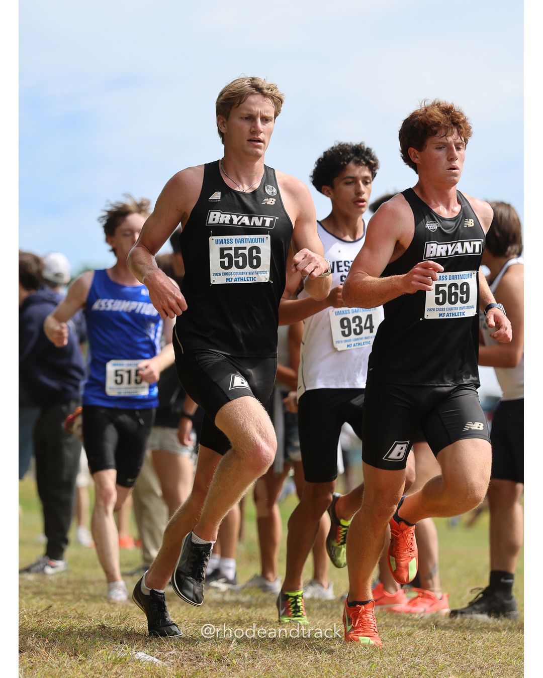 #556 Ryan Bourke, Bryant, 8k Run - Men (Gold-35:cap), P102, 26:48.26; #934 Kenniell Velez Santiago, Westfield State, 8k Run - Men (Gold-35:cap), P127, 27:19.56 - 2026 UMass Dartmouth XC Invitational - UMass Dartmouth - Dartmouth, Massachusetts - September 19, 2026 File: ./260919-2026-UMass-Dartmouth-XC-Invitational-311-398A9283.jpg #556 Ryan Bourke, Bryant, 8k Run - Men (Gold-35:cap), P102, 26:48.26; #934 Kenniell Velez Santiago, Westfield State, 8k Run - Men (Gold-35:…