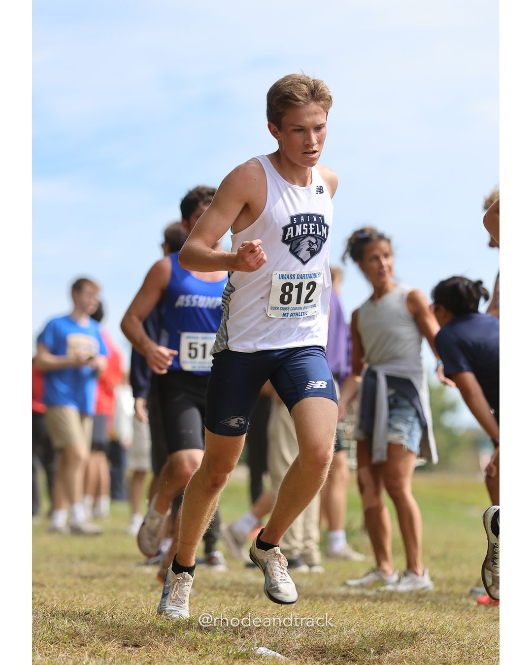 #812 William Oldham, St. Anselm, 8k Run - Men (Gold-35:cap), P139, 27:39.14; #51 Alexa Fisher, Bryant, 6k Run - Women (Navy-45:cap), P66, 25:34.60 - 2026 UMass Dartmouth XC Invitational - UMass Dartmouth - Dartmouth, Massachusetts - September 19, 2026 File: ./260919-2026-UMass-Dartmouth-XC-Invitational-324-398A9529.jpg #812 William Oldham, St. Anselm, 8k Run - Men (Gold-35:cap), P139, 27:39.14; #51 Alexa Fisher, Bryant, 6k Run - Women (Navy-45:cap), P66, 2…