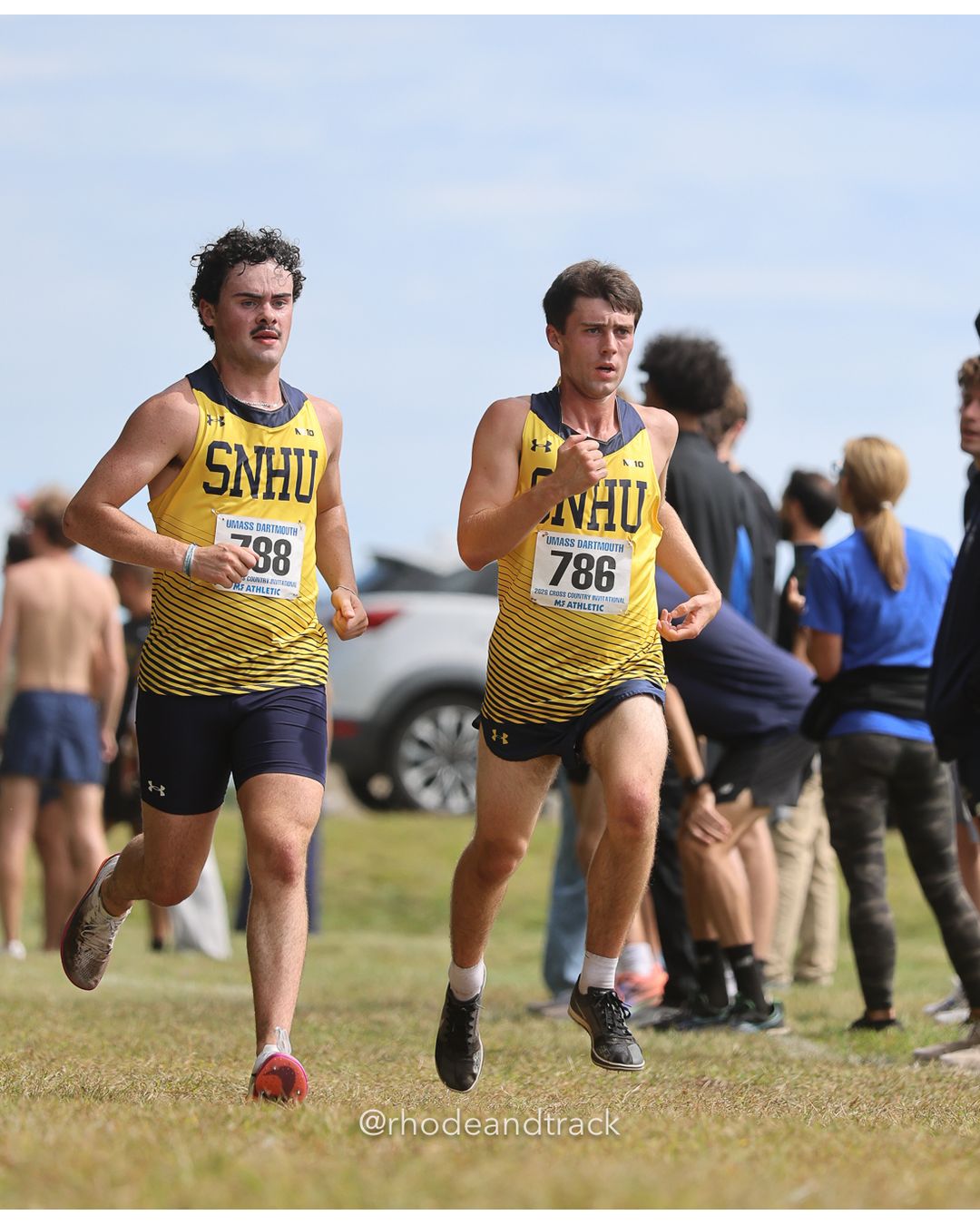 #786 Marcus Clark, SNHU, 8k Run - Men (Gold-35:cap), P147, 27:49.72; #88 Greta Schmitt, Connecticut College, 6k Run - Women (Navy-45:cap), P73, 25:49.44 - 2026 UMass Dartmouth XC Invitational - UMass Dartmouth - Dartmouth, Massachusetts - September 19, 2026 File: ./260919-2026-UMass-Dartmouth-XC-Invitational-331-398A9631.jpg #786 Marcus Clark, SNHU, 8k Run - Men (Gold-35:cap), P147, 27:49.72; #88 Greta Schmitt, Connecticut College, 6k Run - Women (Navy-45:cap),…