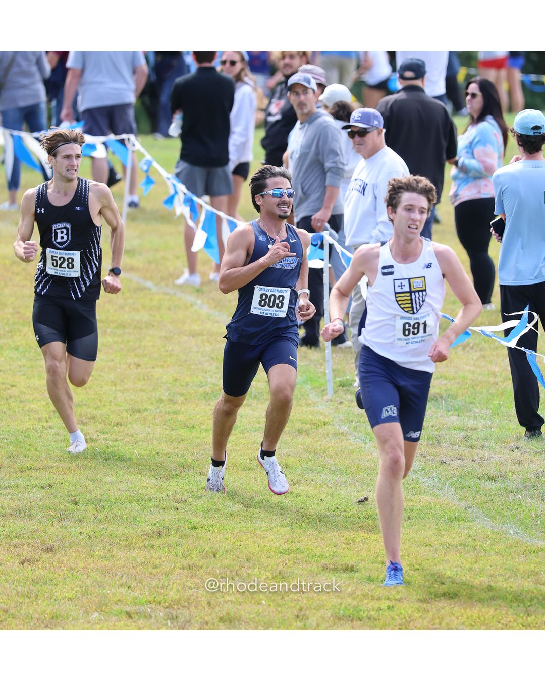 #528 Hayden MacArthur, Bentley, 8k Run - Men (Gold-35:cap), P5, 24:39.32; #691 Aidan Dupill, Merrimack, 8k Run - Men (Gold-35:cap), P4, 24:39.24; #803 Colton Sallum, So. Conn. St., 8k Run - Men (Gold-35:cap), P6, 24:39.33 - 2026 UMass Dartmouth XC Invitational - UMass Dartmouth - Dartmouth, Massachusetts - September 19, 2026 File: ./260919-2026-UMass-Dartmouth-XC-Invitational-344-398A9955.jpg #528 Hayden MacArthur, Bentley, 8k Run - Men (Gold-35:cap), P5, 24:39.32; #691 Aidan Dupill, Merrimack, 8k Run - Men (Gold-35:cap), P4, 24:…