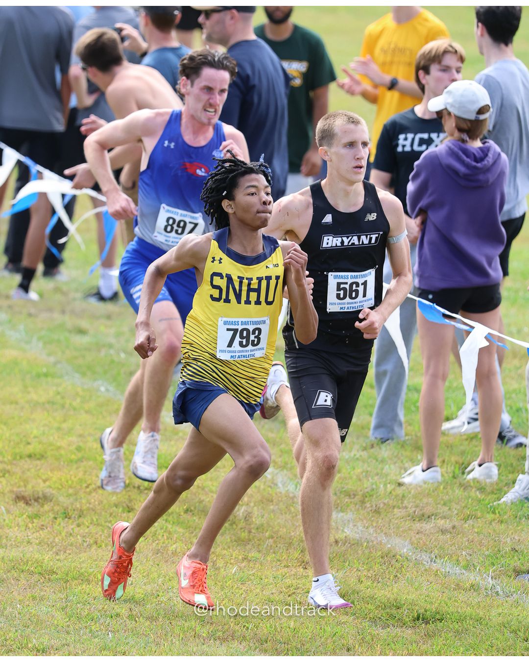 #793 Ross Wallace, SNHU, 8k Run - Men (Gold-35:cap), P18, 25:11.00; #561 Andrew McConnell, Bryant, 8k Run - Men (Gold-35:cap), P19, 25:11.97; #897 Nicolas Uzzo, UMass Lowell, 8k Run - Men (Gold-35:cap), P17, 25:10.32 - 2026 UMass Dartmouth XC Invitational - UMass Dartmouth - Dartmouth, Massachusetts - September 19, 2026 File: ./260919-2026-UMass-Dartmouth-XC-Invitational-354-398A0218.jpg #793 Ross Wallace, SNHU, 8k Run - Men (Gold-35:cap), P18, 25:11.00; #561 Andrew McConnell, Bryant, 8k Run - Men (Gold-35:cap), P19, 25:11.9…