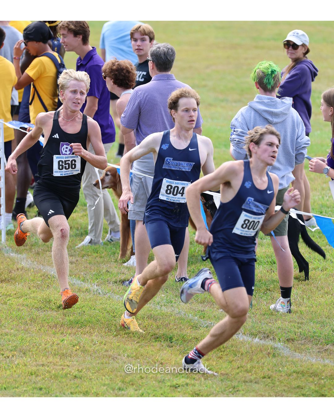 #800 Dominic Lombardo, So. Conn. St., 8k Run - Men (Gold-35:cap), P49, 25:55.31; #804 Dominic Tartarelli, So. Conn. St., 8k Run - Men (Gold-35:cap), P52, 25:56.74; #656 Ian Morgan, Holy Cross, 8k Run - Men (Gold-35:cap), P50, 25:55.63 - 2026 UMass Dartmouth XC Invitational - UMass Dartmouth - Dartmouth, Massachusetts - September 19, 2026 File: ./260919-2026-UMass-Dartmouth-XC-Invitational-383-398A0779.jpg #800 Dominic Lombardo, So. Conn. St., 8k Run - Men (Gold-35:cap), P49, 25:55.31; #804 Dominic Tartarelli, So. Conn. St., 8k Run - Men (Gold…