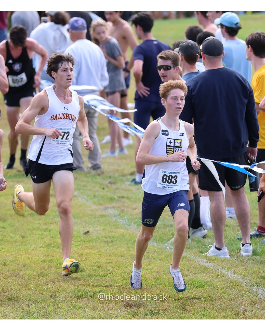 #693 Trainor Mailloux, Merrimack, 8k Run - Men (Gold-35:cap), P76, 26:22.19; #72 Caroline Graziani, Connecticut College, 6k Run - Women (Navy-45:cap), P58, 25:19.96 - 2026 UMass Dartmouth XC Invitational - UMass Dartmouth - Dartmouth, Massachusetts - September 19, 2026 File: ./260919-2026-UMass-Dartmouth-XC-Invitational-401-398A1083.jpg #693 Trainor Mailloux, Merrimack, 8k Run - Men (Gold-35:cap), P76, 26:22.19; #72 Caroline Graziani, Connecticut College, 6k Run - Women (Na…