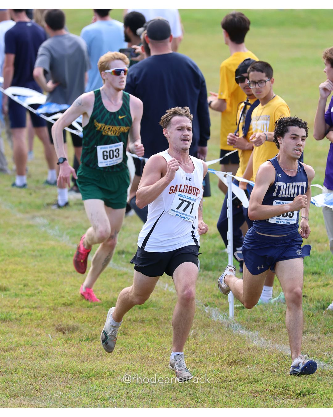 #771 Justin Friscia, Salisbury, 8k Run - Men (Gold-35:cap), P93, 26:38.64; #603 Samuel Edwards, Fitchburg St., 8k Run - Men (Gold-35:cap), P94, 26:39.07 - 2026 UMass Dartmouth XC Invitational - UMass Dartmouth - Dartmouth, Massachusetts - September 19, 2026 File: ./260919-2026-UMass-Dartmouth-XC-Invitational-416-398A1343.jpg #771 Justin Friscia, Salisbury, 8k Run - Men (Gold-35:cap), P93, 26:38.64; #603 Samuel Edwards, Fitchburg St., 8k Run - Men (Gold-35:cap),…