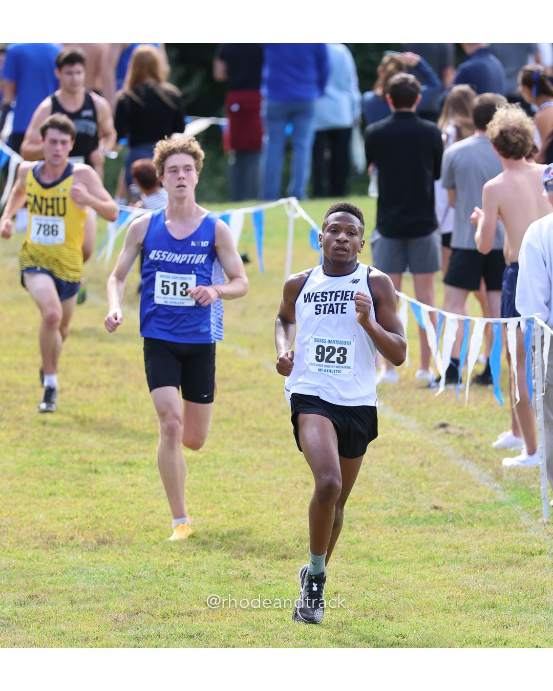 #923 Prince Calhoun, Westfield State, 8k Run - Men (Gold-35:cap), P148, 27:50.58; #513 Eli Lipson, Assumption, 8k Run - Men (Gold-35:cap), P149, 27:51.73; #186 Makenzie Grenier, Mass. Maritime, 6k Run - Women (Gold-35:cap), P235, 32:19.96 - 2026 UMass Dartmouth XC Invitational - UMass Dartmouth - Dartmouth, Massachusetts - September 19, 2026 File: ./260919-2026-UMass-Dartmouth-XC-Invitational-462-398A2316.jpg #923 Prince Calhoun, Westfield State, 8k Run - Men (Gold-35:cap), P148, 27:50.58; #513 Eli Lipson, Assumption, 8k Run - Men (Gold-35:cap),…