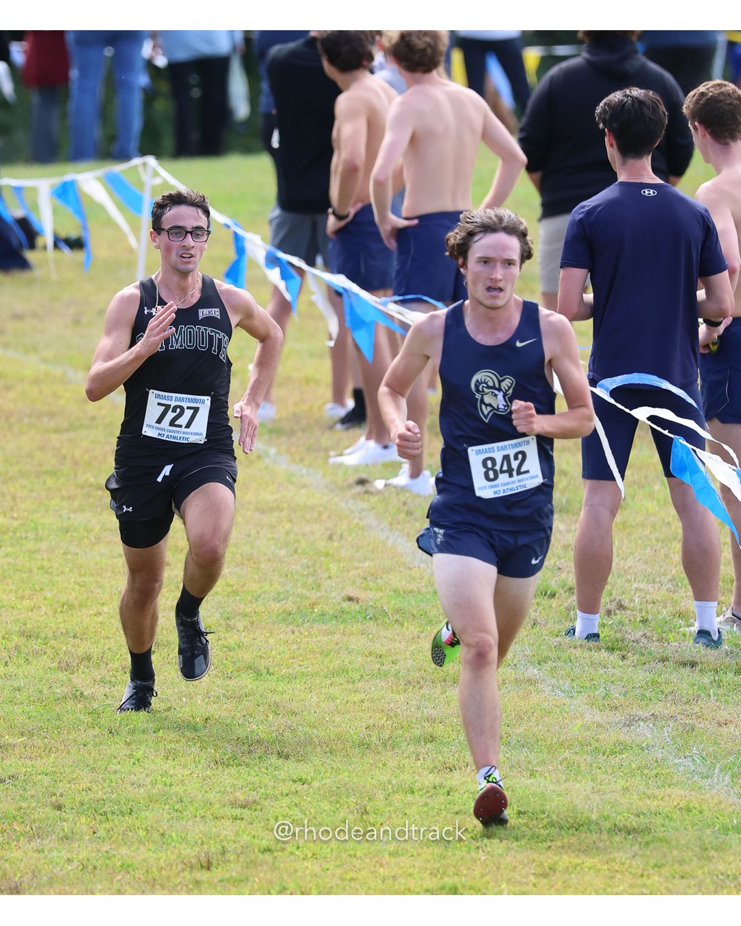 #842 Declan Shannon, Suffolk, 8k Run - Men (Gold-35:cap), P165, 28:14.84; #727 Angelo DeLuca, Plymouth State, 8k Run - Men (Gold-35:cap), P166, 28:14.92 - 2026 UMass Dartmouth XC Invitational - UMass Dartmouth - Dartmouth, Massachusetts - September 19, 2026 File: ./260919-2026-UMass-Dartmouth-XC-Invitational-474-398A2601.jpg #842 Declan Shannon, Suffolk, 8k Run - Men (Gold-35:cap), P165, 28:14.84; #727 Angelo DeLuca, Plymouth State, 8k Run - Men (Gold-35:cap), P…