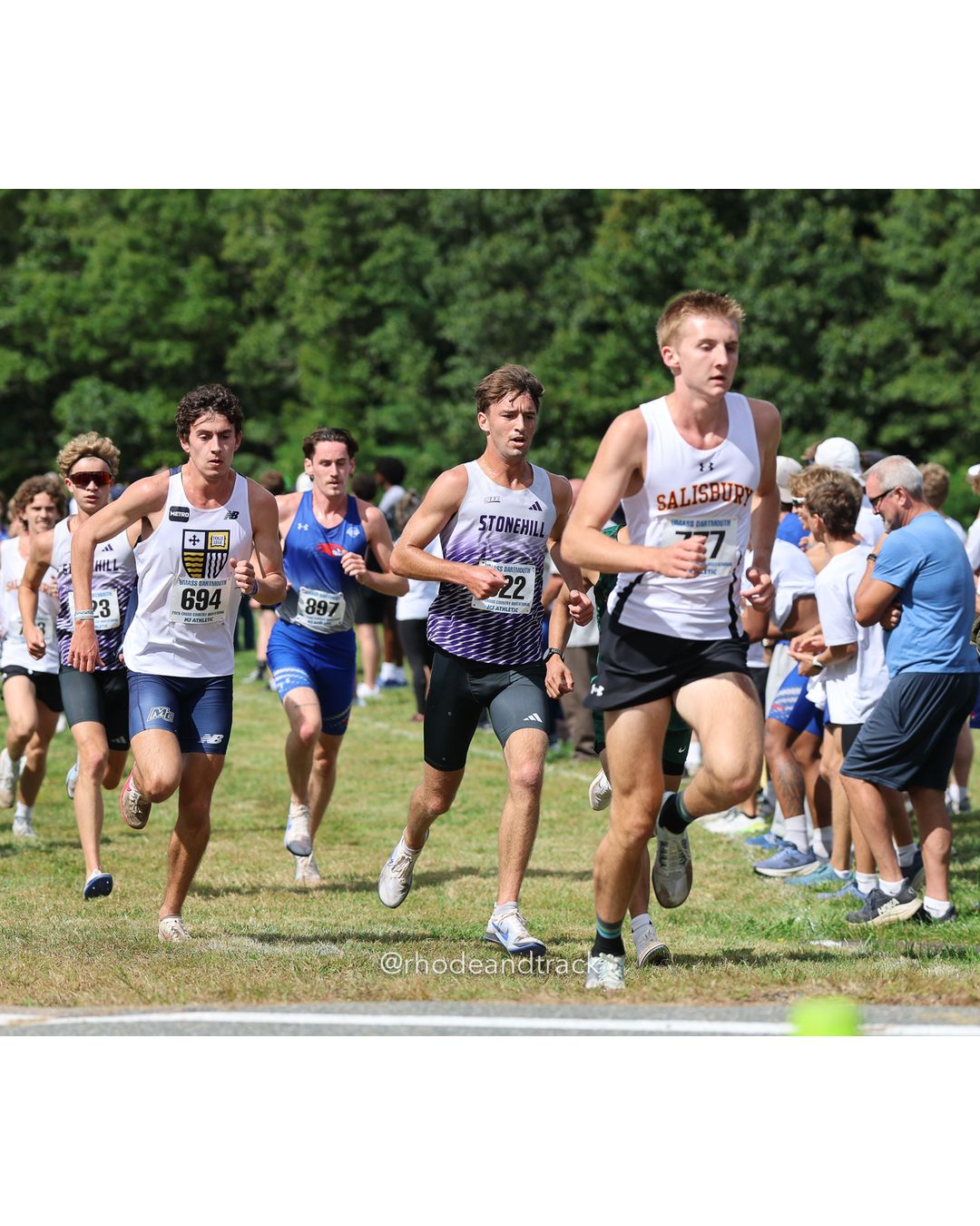 #694 Sean Moore, Merrimack, 8k Run - Men (Gold-35:cap), P43, 25:49.77; #897 Nicolas Uzzo, UMass Lowell, 8k Run - Men (Gold-35:cap), P17, 25:10.32 - 2026 UMass Dartmouth XC Invitational - UMass Dartmouth - Dartmouth, Massachusetts - September 19, 2026 File: ./260919-2026-UMass-Dartmouth-XC-Invitational-48-398A4535.jpg #694 Sean Moore, Merrimack, 8k Run - Men (Gold-35:cap), P43, 25:49.77; #897 Nicolas Uzzo, UMass Lowell, 8k Run - Men (Gold-35:cap), P17, 25…