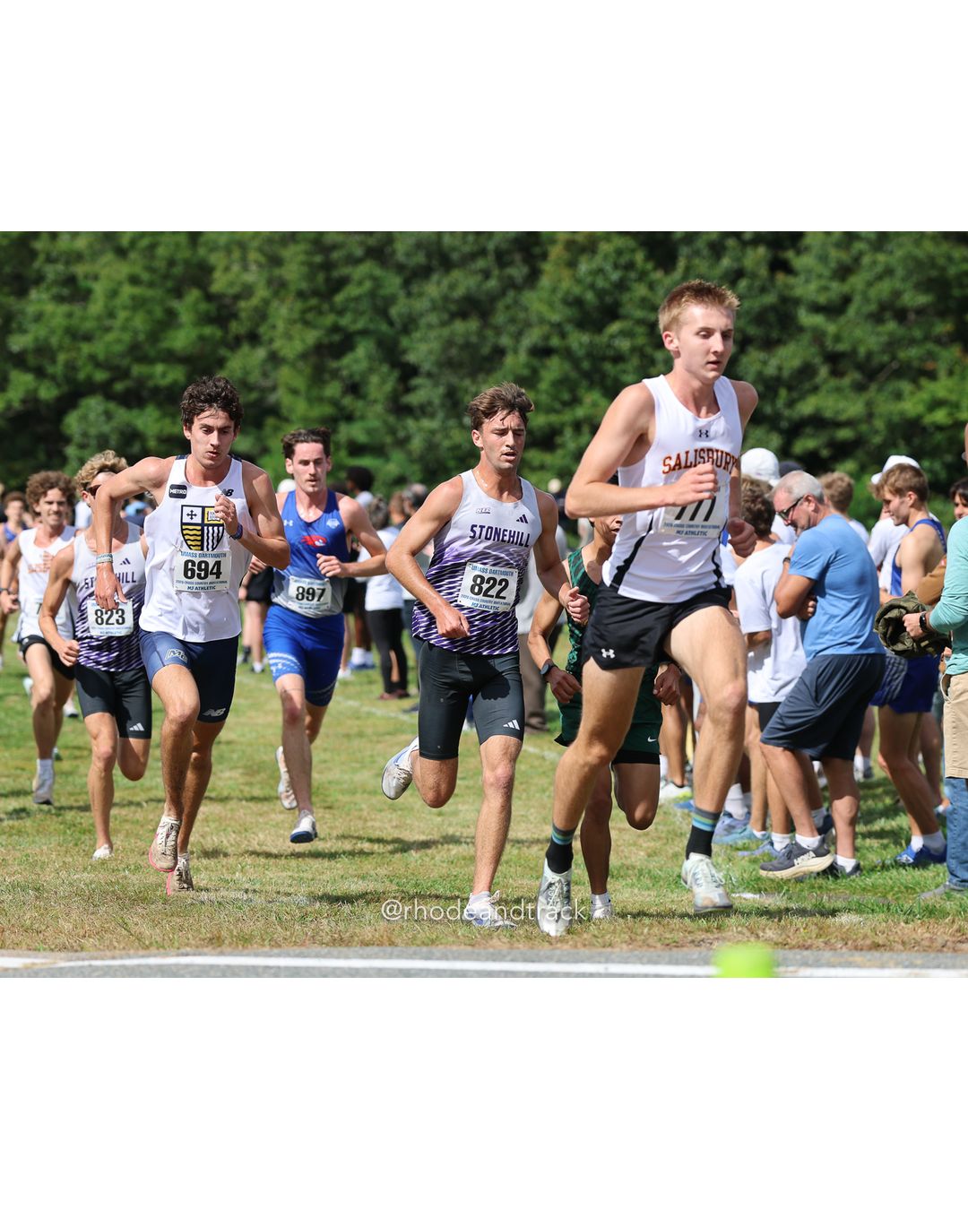 #822 Nicholas Davies, Stonehill, 8k Run - Men (Gold-35:cap), P10, 25:02.10; #694 Sean Moore, Merrimack, 8k Run - Men (Gold-35:cap), P43, 25:49.77; #897 Nicolas Uzzo, UMass Lowell, 8k Run - Men (Gold-35:cap), P17, 25:10.32 - 2026 UMass Dartmouth XC Invitational - UMass Dartmouth - Dartmouth, Massachusetts - September 19, 2026 File: ./260919-2026-UMass-Dartmouth-XC-Invitational-49-398A4538.jpg #822 Nicholas Davies, Stonehill, 8k Run - Men (Gold-35:cap), P10, 25:02.10; #694 Sean Moore, Merrimack, 8k Run - Men (Gold-35:cap), P43, 25…