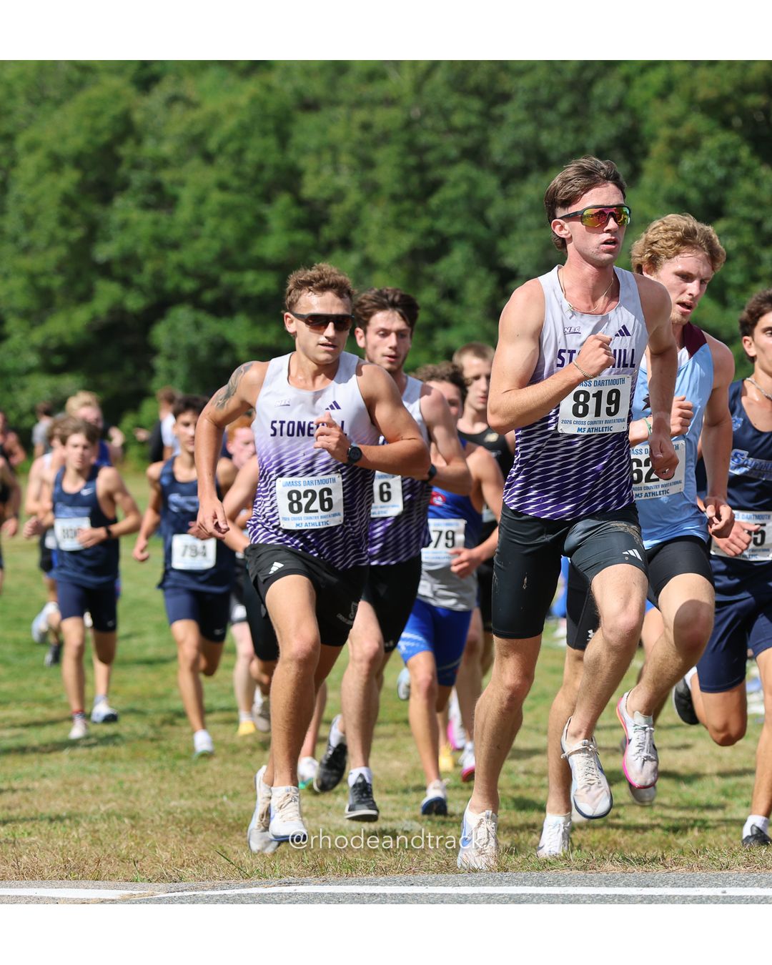 #819 Ian Bubar, Stonehill, 8k Run - Men (Gold-35:cap), P13, 25:05.29; #826 Connor Magill, Stonehill, 8k Run - Men (Gold-35:cap), P22, 25:17.69; #79 Alyssa Lynch, Connecticut College, 6k Run - Women (Navy-45:cap), P116, 27:41.55 - 2026 UMass Dartmouth XC Invitational - UMass Dartmouth - Dartmouth, Massachusetts - September 19, 2026 File: ./260919-2026-UMass-Dartmouth-XC-Invitational-62-398A4737.jpg #819 Ian Bubar, Stonehill, 8k Run - Men (Gold-35:cap), P13, 25:05.29; #826 Connor Magill, Stonehill, 8k Run - Men (Gold-35:cap), P22, 25:17…