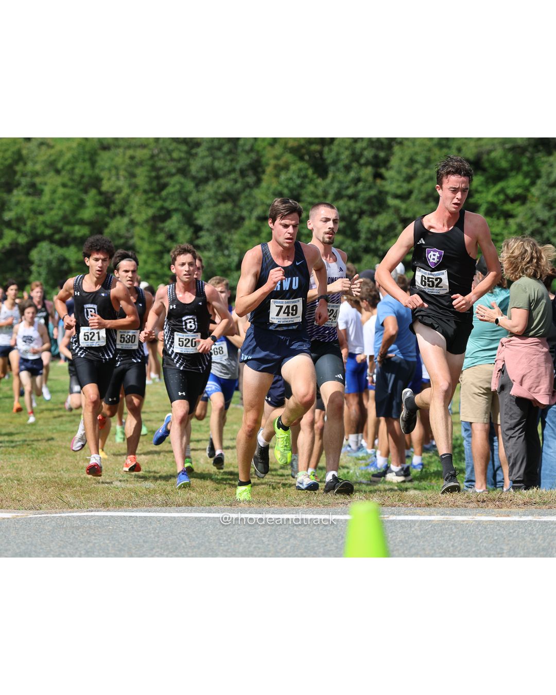#652 John (Jack) Larkin, Holy Cross, 8k Run - Men (Gold-35:cap), P84, 26:30.66; #749 Nathan Evans, Roger Williams, 8k Run - Men (Gold-35:cap), P56, 25:59.73; #521 Rocco Bueti, Bentley, 8k Run - Men (Gold-35:cap), P53, 25:57.54 - 2026 UMass Dartmouth XC Invitational - UMass Dartmouth - Dartmouth, Massachusetts - September 19, 2026 File: ./260919-2026-UMass-Dartmouth-XC-Invitational-71-398A4867.jpg #652 John (Jack) Larkin, Holy Cross, 8k Run - Men (Gold-35:cap), P84, 26:30.66; #749 Nathan Evans, Roger Williams, 8k Run - Men (Gold-35:ca…