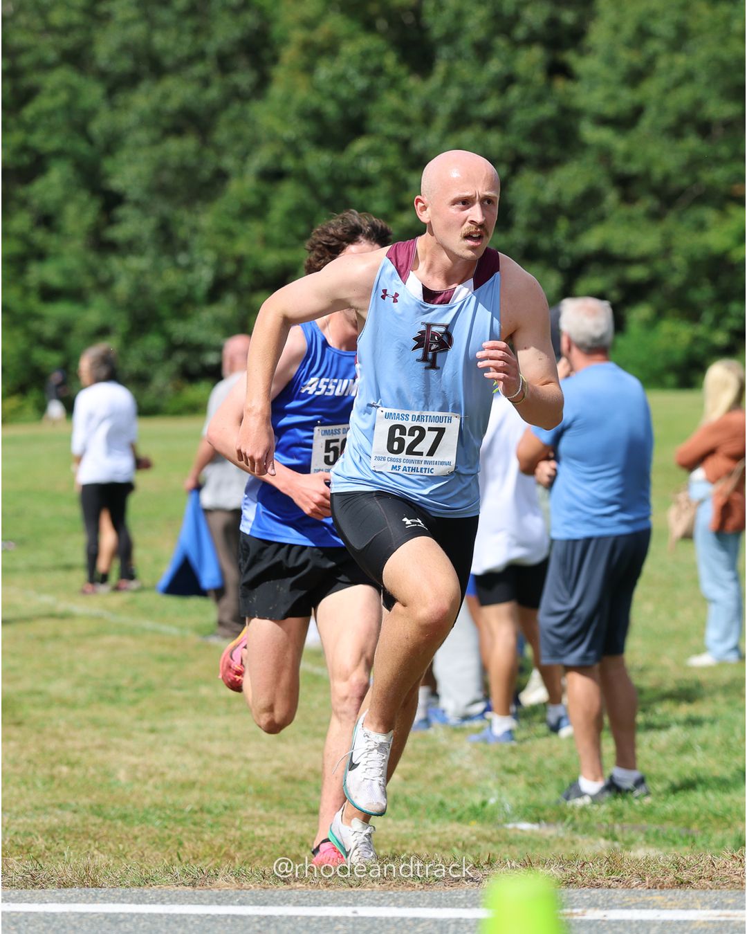 #627 Declan Morgan, Franklin Pierce, 8k Run - Men (Gold-35:cap), P98, 26:45.80; #5 Darcy Derose, American Int'l, 6k Run - Women (Navy-45:cap), P176, 37:12.86 - 2026 UMass Dartmouth XC Invitational - UMass Dartmouth - Dartmouth, Massachusetts - September 19, 2026 File: ./260919-2026-UMass-Dartmouth-XC-Invitational-85-398A5094.jpg #627 Declan Morgan, Franklin Pierce, 8k Run - Men (Gold-35:cap), P98, 26:45.80; #5 Darcy Derose, American Int'l, 6k Run - Women (Navy-45:ca…