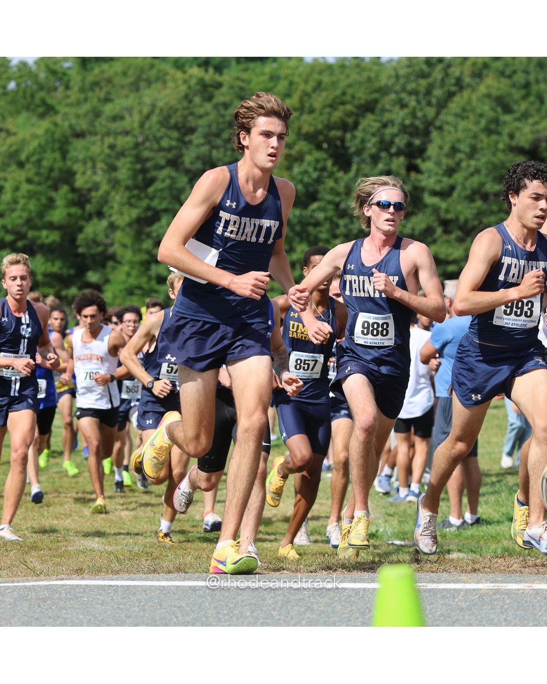 #988 Dolan Pols, Trinity (Conn.), 8k Run - Men (Gold-35:cap), P116, 27:03.96; #857 Maurice King, UMass Dartmouth, 8k Run - Men (Gold-35:cap), P110, 26:58.36 - 2026 UMass Dartmouth XC Invitational - UMass Dartmouth - Dartmouth, Massachusetts - September 19, 2026 File: ./260919-2026-UMass-Dartmouth-XC-Invitational-93-398A5270.jpg #988 Dolan Pols, Trinity (Conn.), 8k Run - Men (Gold-35:cap), P116, 27:03.96; #857 Maurice King, UMass Dartmouth, 8k Run - Men (Gold-35:cap…