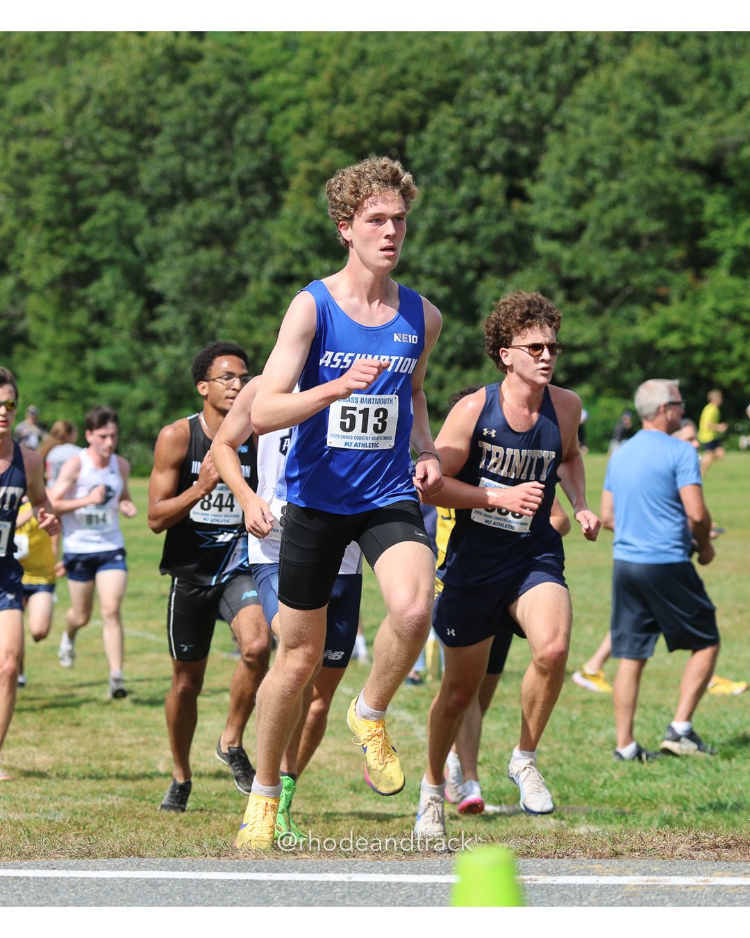 #513 Eli Lipson, Assumption, 8k Run - Men (Gold-35:cap), P149, 27:51.73; #844 Jayden Ferreras, UMass Boston, 8k Run - Men (Gold-35:cap), P201, 29:36.64 - 2026 UMass Dartmouth XC Invitational - UMass Dartmouth - Dartmouth, Massachusetts - September 19, 2026 File: ./260919-2026-UMass-Dartmouth-XC-Invitational-98-398A5365.jpg #513 Eli Lipson, Assumption, 8k Run - Men (Gold-35:cap), P149, 27:51.73; #844 Jayden Ferreras, UMass Boston, 8k Run - Men (Gold-35:cap), P2…