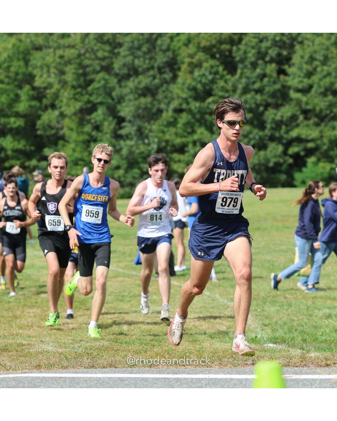 #979 Tim Hamilton, Trinity (Conn.), 8k Run - Men (Gold-35:cap), P186, 28:57.31; #959 Ryan Wing, Worcester State, 8k Run - Men (Gold-35:cap), P146, 27:46.63; #659 Quinn Salmon, Holy Cross, 8k Run - Men (Gold-35:cap), P137, 27:37.96 - 2026 UMass Dartmouth XC Invitational - UMass Dartmouth - Dartmouth, Massachusetts - September 19, 2026 File: ./260919-2026-UMass-Dartmouth-XC-Invitational-99-398A5391.jpg #979 Tim Hamilton, Trinity (Conn.), 8k Run - Men (Gold-35:cap), P186, 28:57.31; #959 Ryan Wing, Worcester State, 8k Run - Men (Gold-35:cap)…